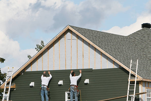 Professional Siding Contractor technician working in Louisburg, NC